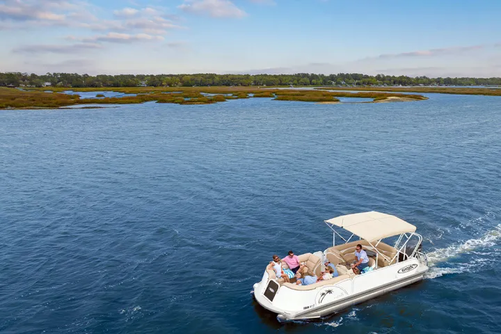 a small boat in a large body of water