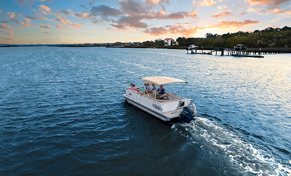 a pontoon in a body of water a pontoon in a body of water