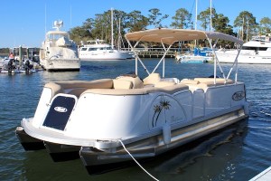 a boat is docked next to a body of water