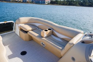 a boat that is sitting in front of a body of water