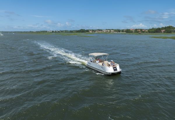 a small boat in a body of water