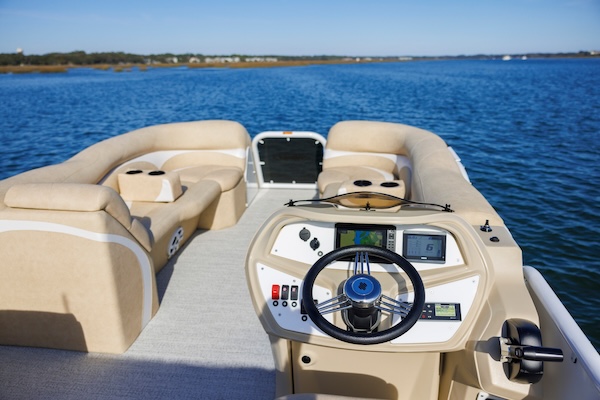 a boat parked next to a body of water