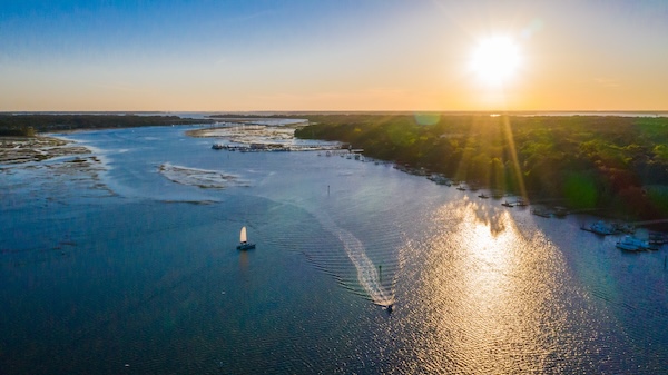 a sunset over a body of water